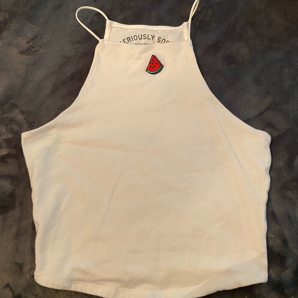 White cami with a watermelon print on it